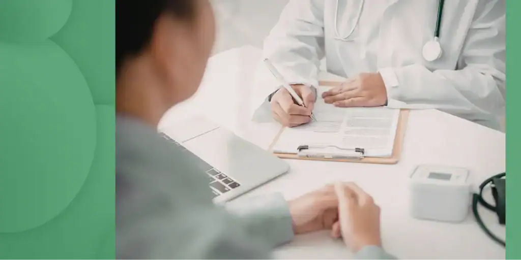 Online Counseling session with a therapist taking notes during a one-on-one mental health consultation in a calm clinical setting