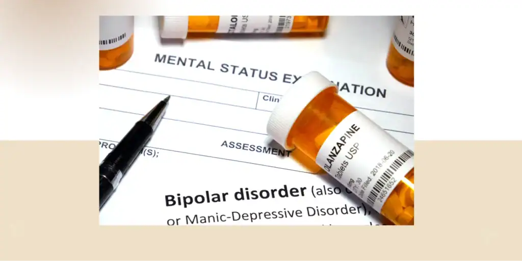 Close-up of a bipolar disorder assessment form with prescription medication bottles and a pen, representing early signs of bipolar disorder in teens, mood changes, mental health diagnosis and emotional treatment support. 