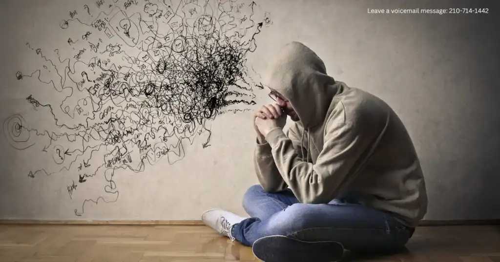 Young adults sit on the floor with their heads bowed as chaotic thoughts and tangled sketches burst from their minds, illustrating why young adults feel lost, overwhelmed by anxiety, uncertainty, identity struggles, and the pressure of finding direction in life.
